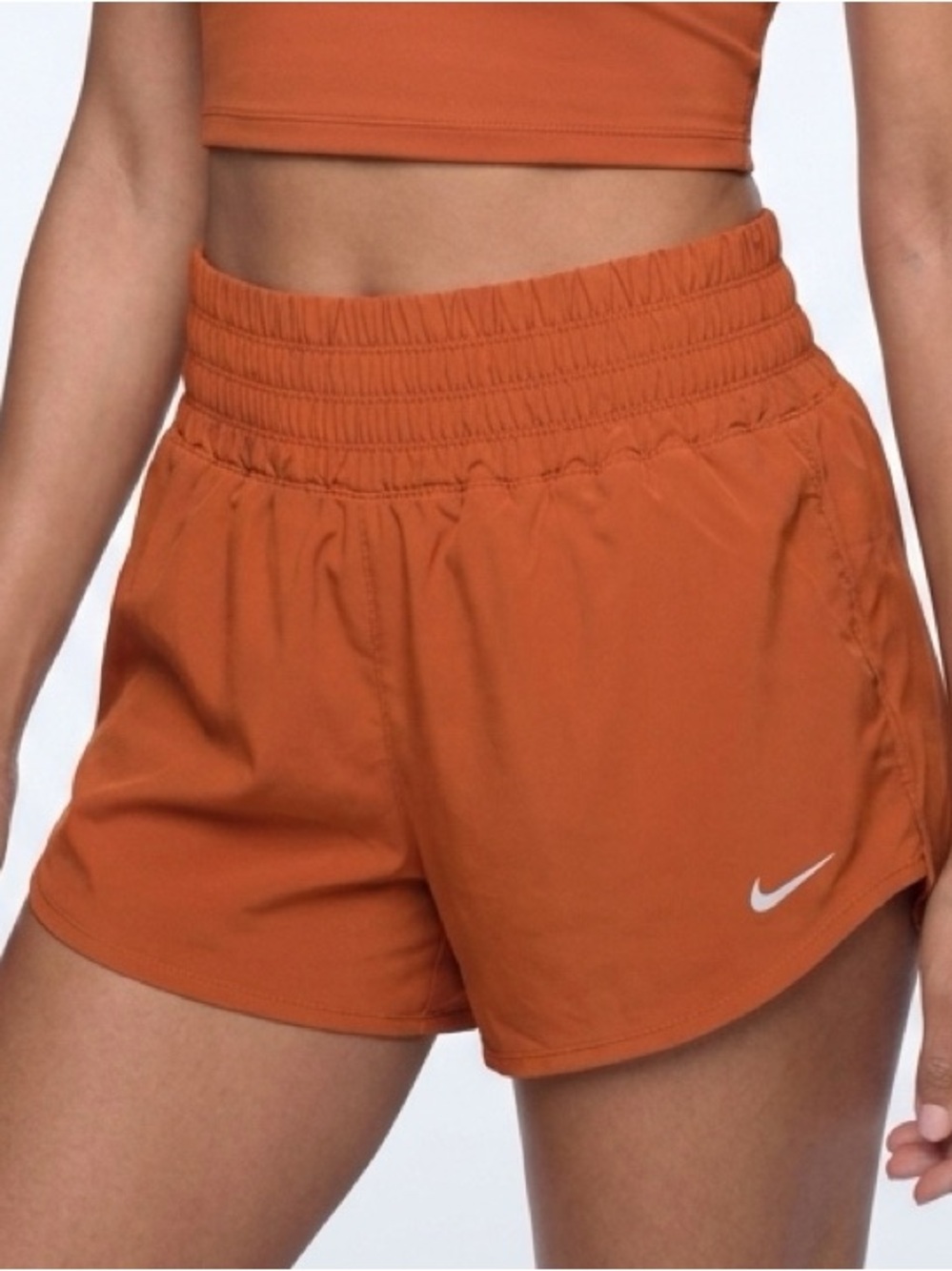 Nike Women's Athletic Shorts in Rust Orange with White Swoosh